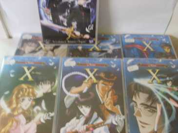 Fotografía: Proponga a vender 7 DVDs X DE CLAMP